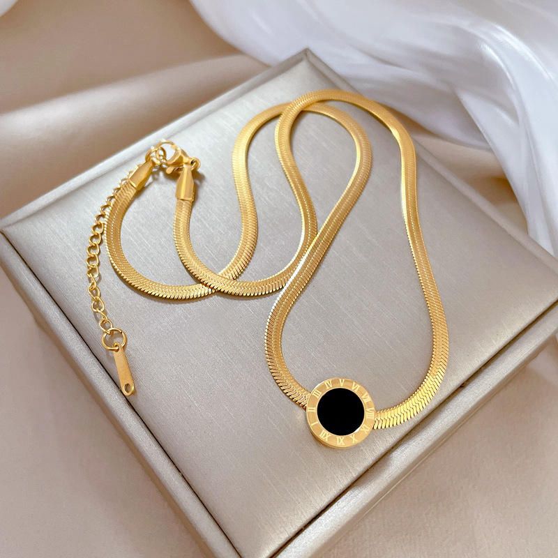 Golden Snake Chain Necklace with Black Round Pendant